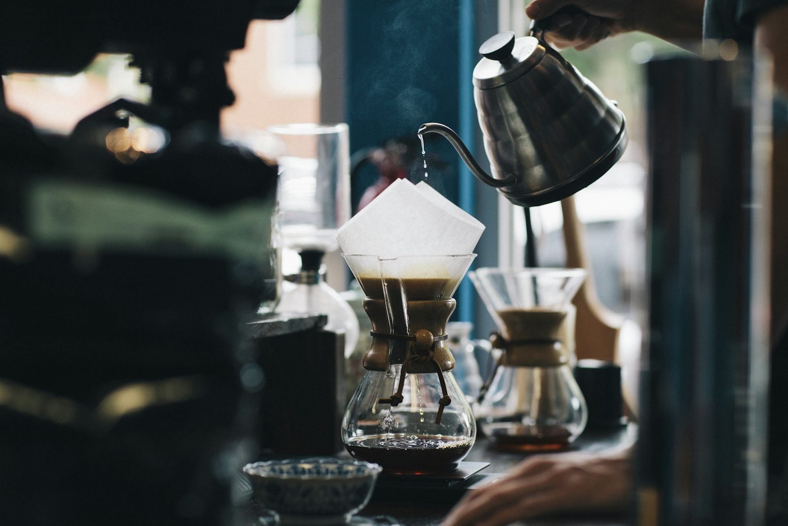 Barista making pour-over coffee
